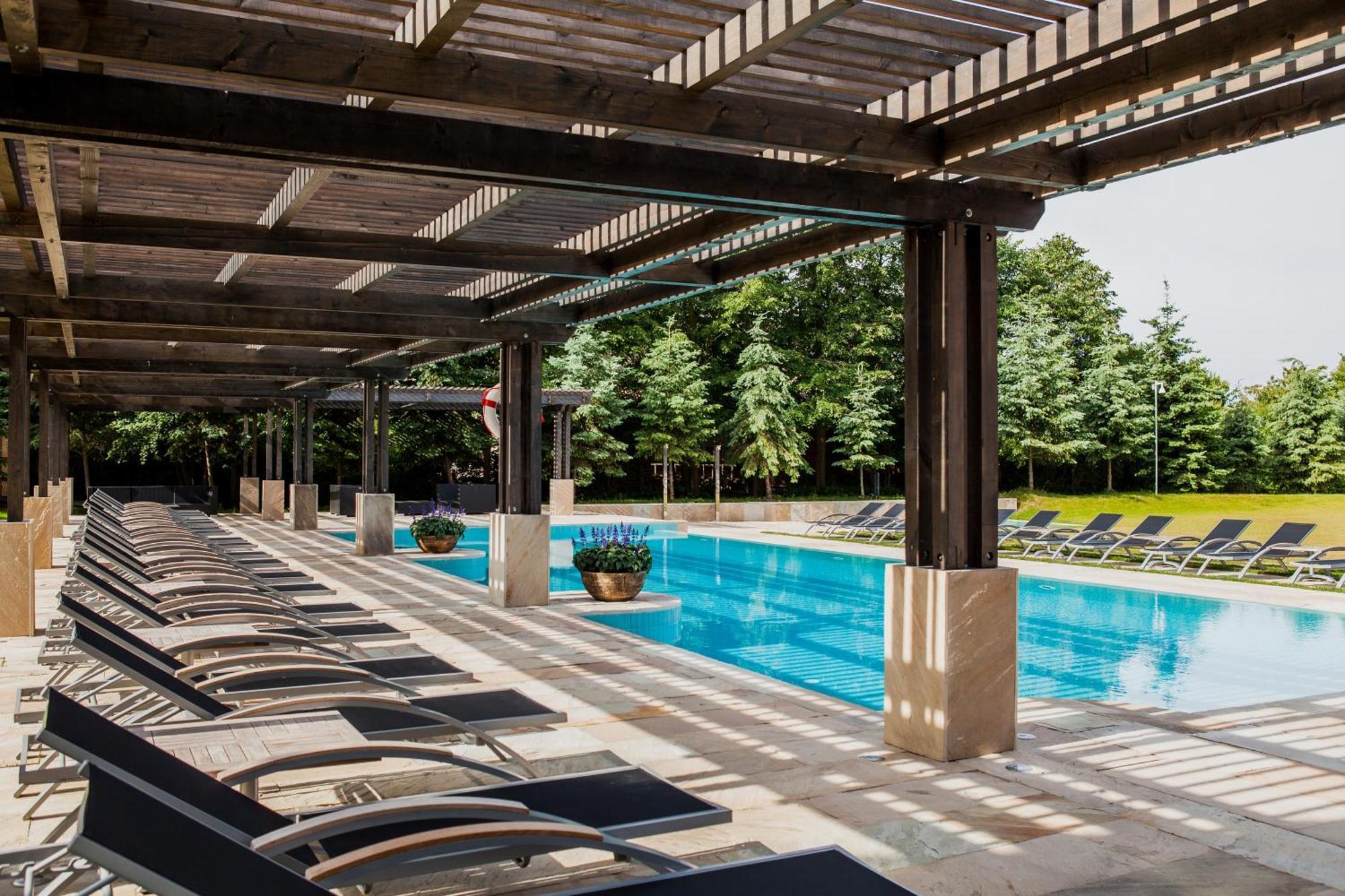 Mercure Palanga Vanagupe Resort & Spa Exterior photo The pool at the Four Seasons Hotel