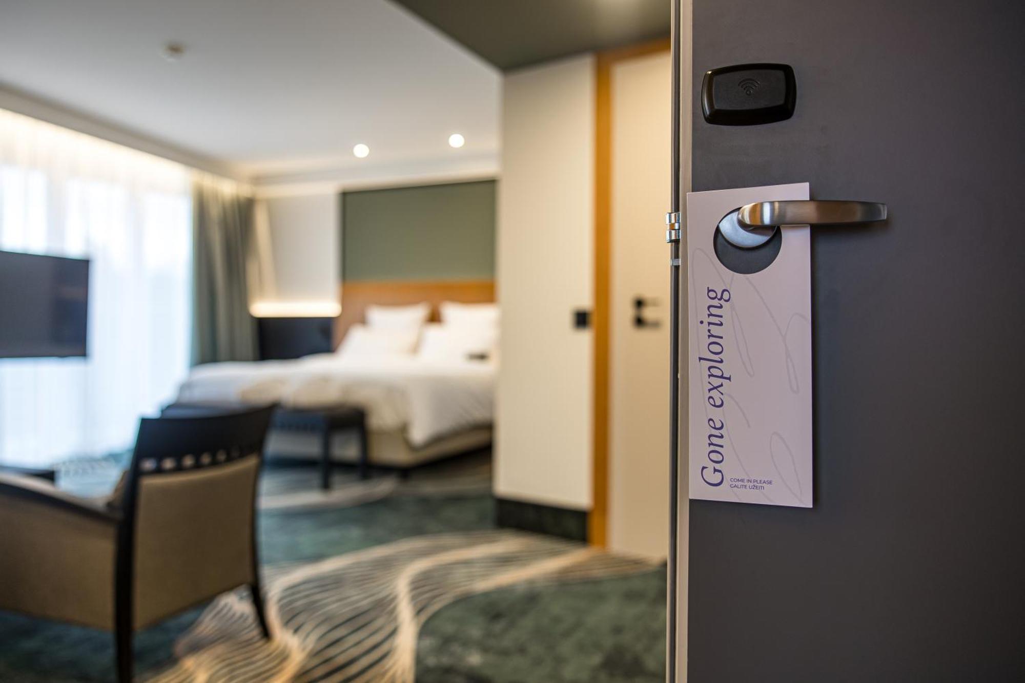 Mercure Palanga Vanagupe Resort & Spa Exterior photo A door sign